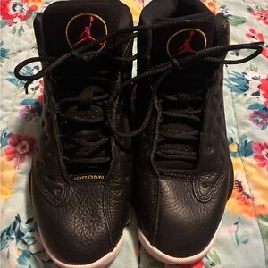 Jordan Black Sneakers with Red and Gold Details